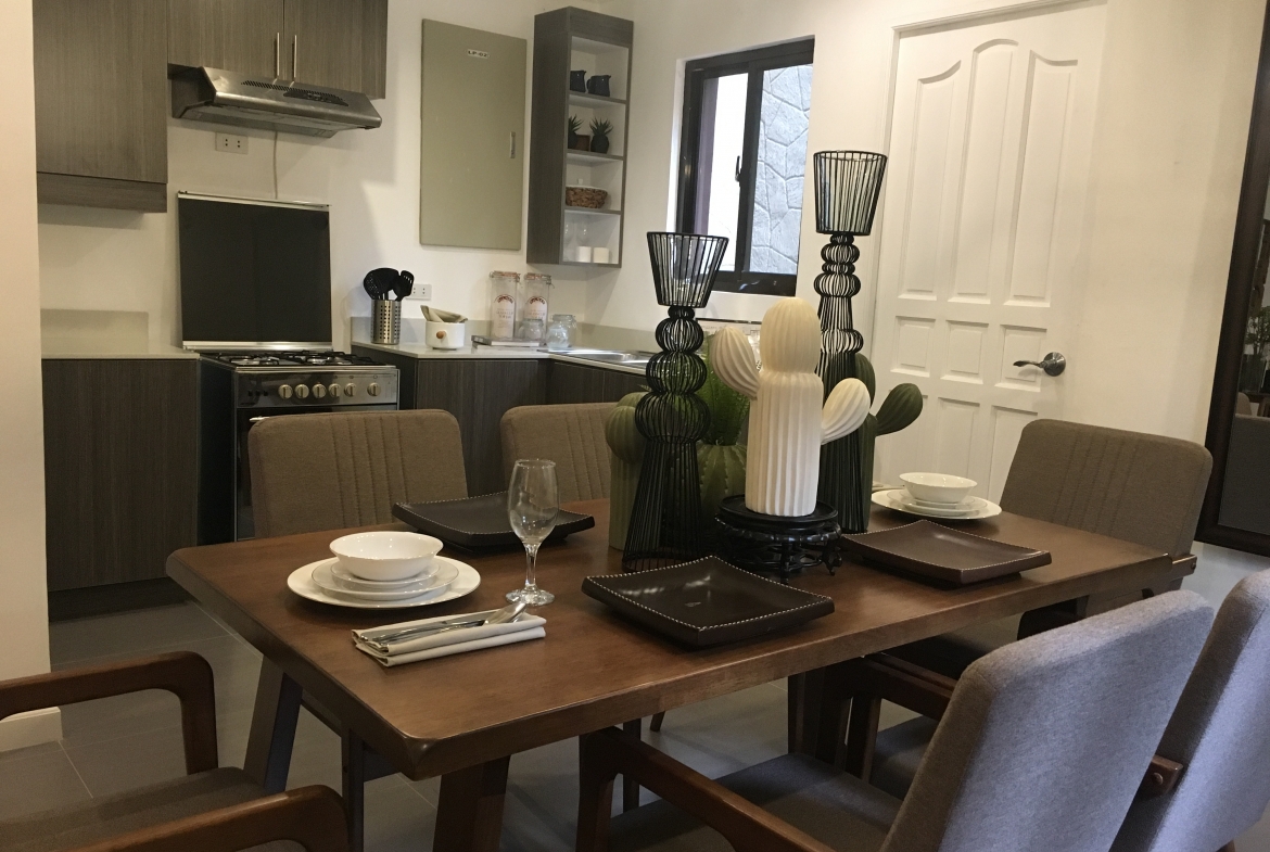 Dining area and kitchen interior in Chatelard luxury home